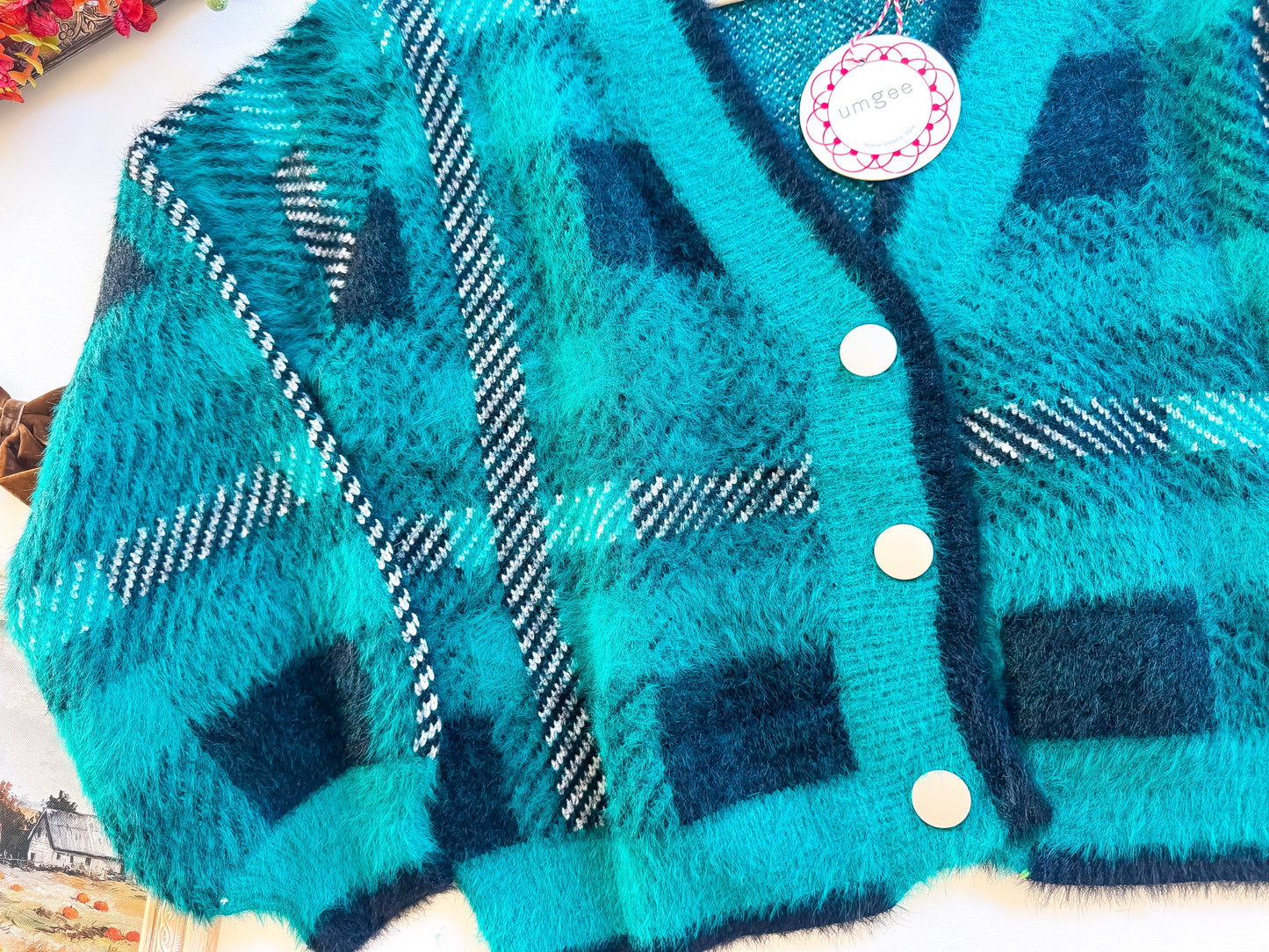 Emerald Pines Plaid Fuzzy Cardigan texture close-up