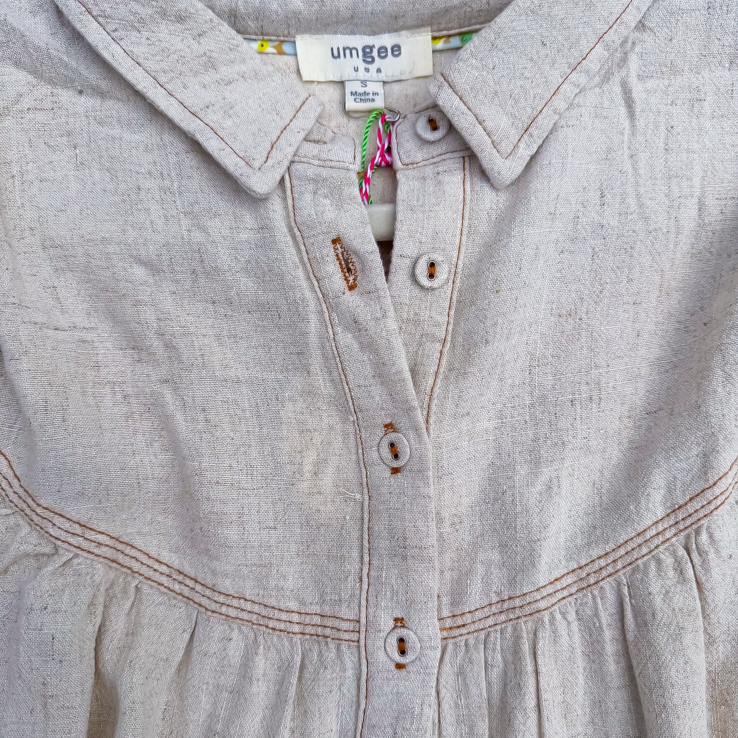 Oatmeal Fringe Hem Linen Button-Up Babydoll Top close-up