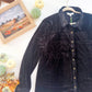 Velvet button-up pocket and button detail
