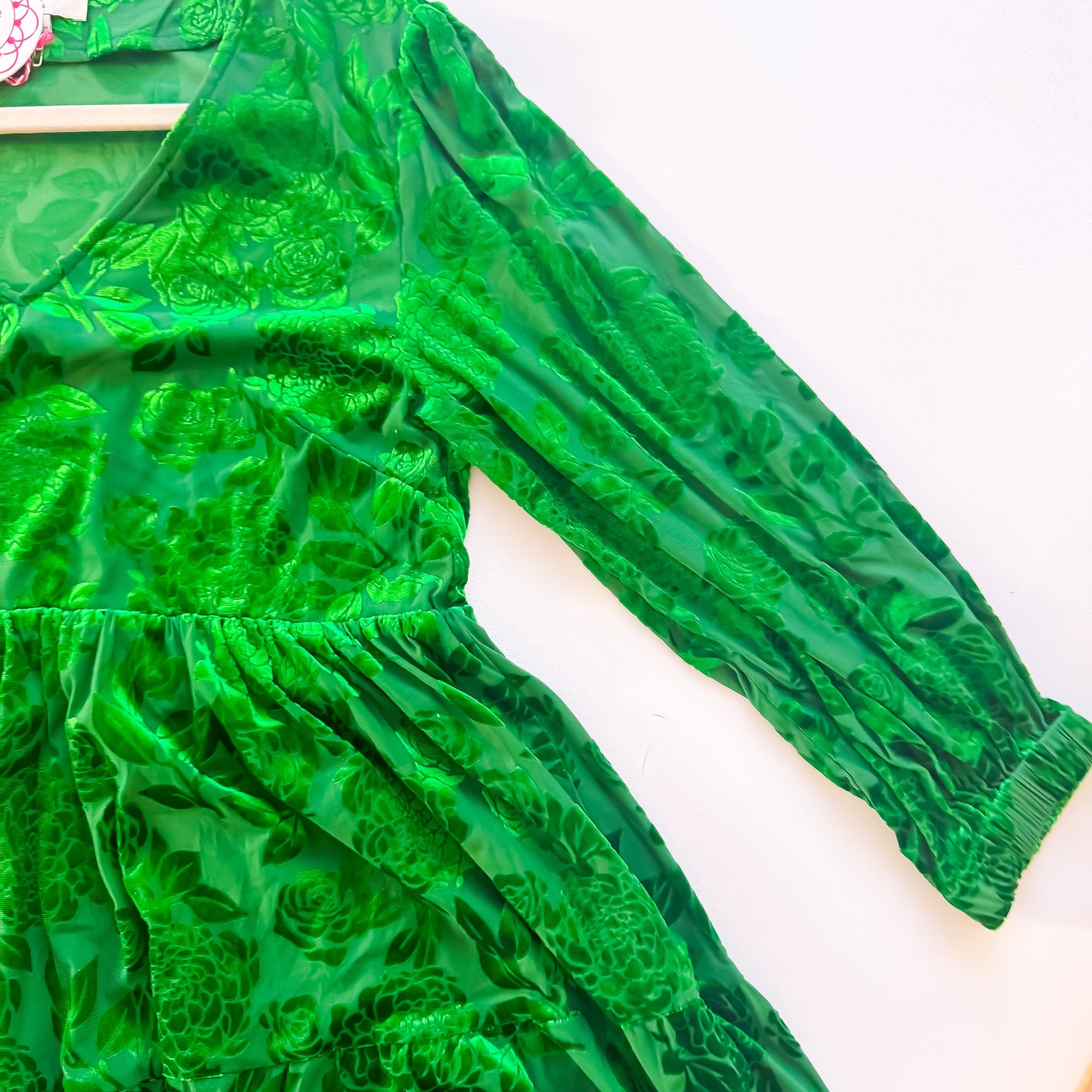 Velvet dress sleeve and tiered skirt detail