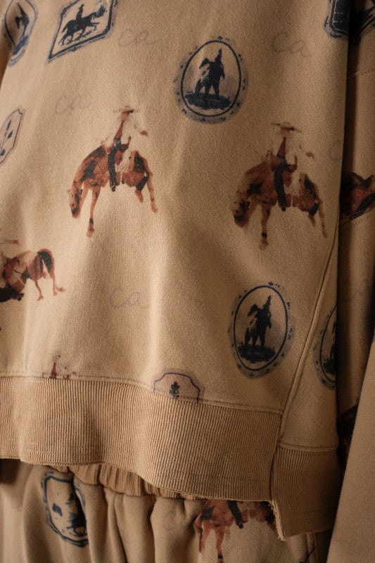 Western print sweatshirt hem detail