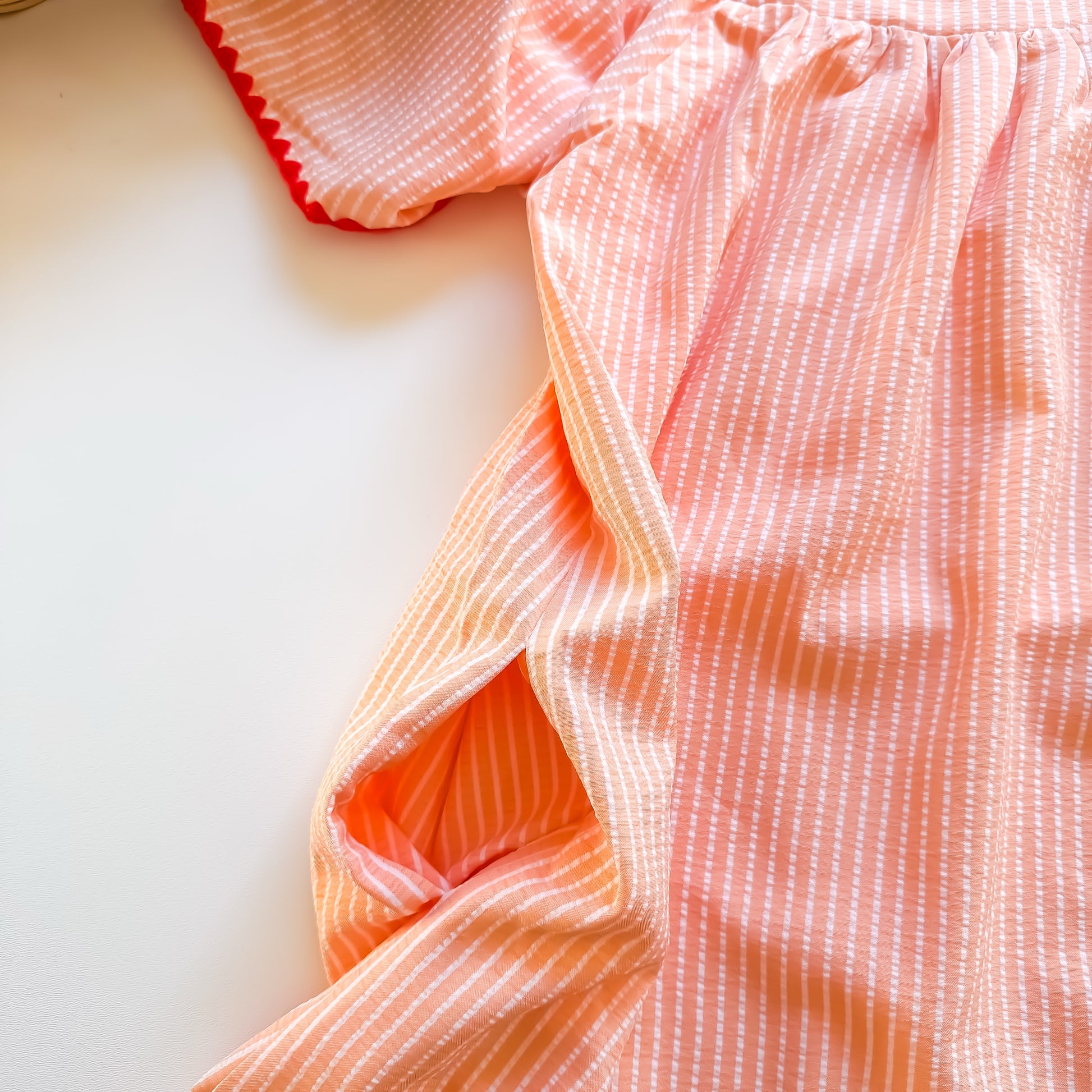 Apricot dress pocket detail