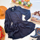 Black satin beaded collar belted tiered shirt dress flat lay