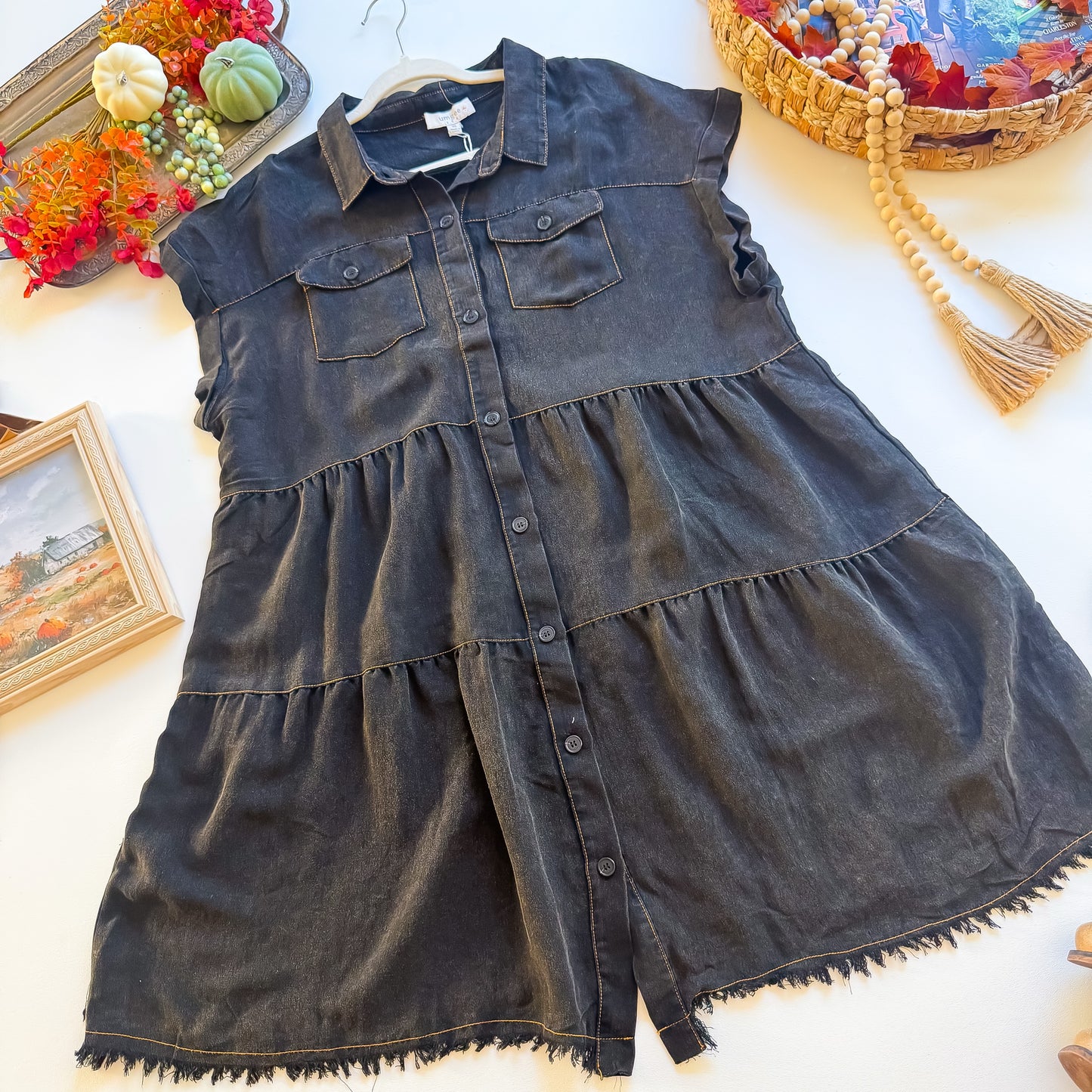 Washed black tiered Umgee plus shirt dress with chest pockets and frayed hem, flat lay