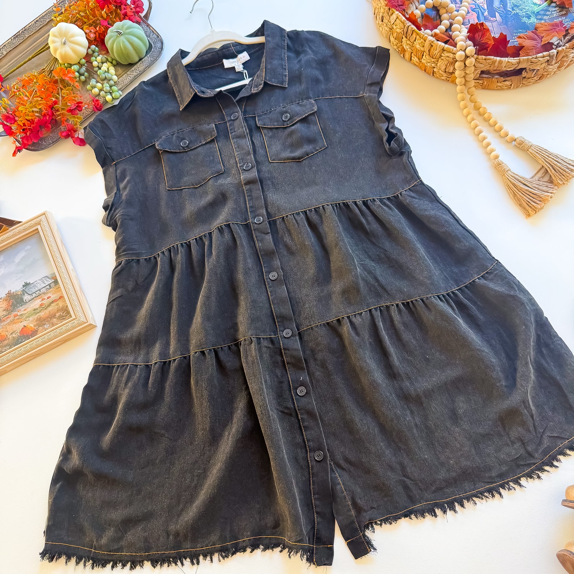 Washed black tiered Umgee plus shirt dress with chest pockets and frayed hem, flat lay