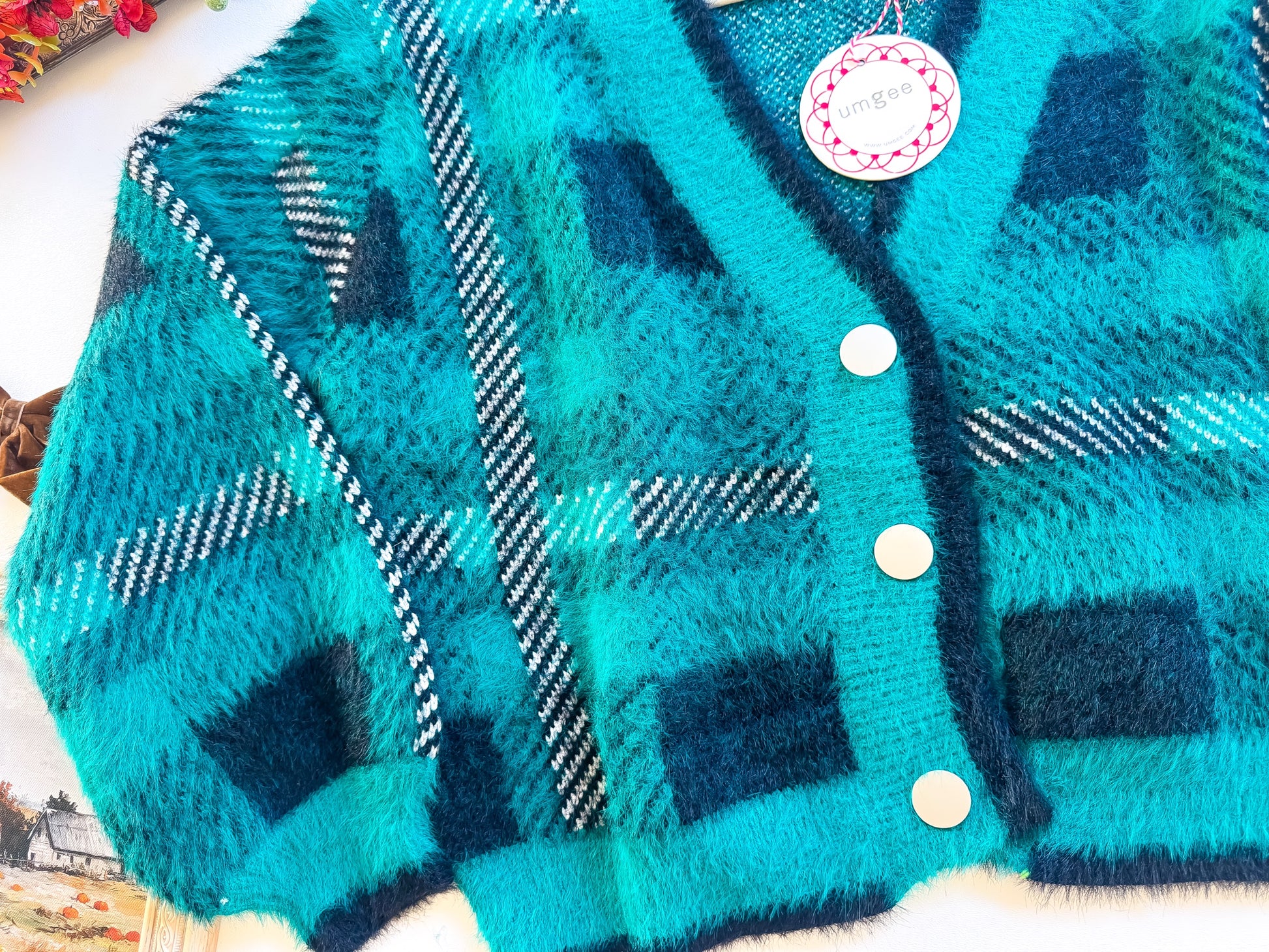 Emerald Pines Plaid Fuzzy Cardigan texture close-up