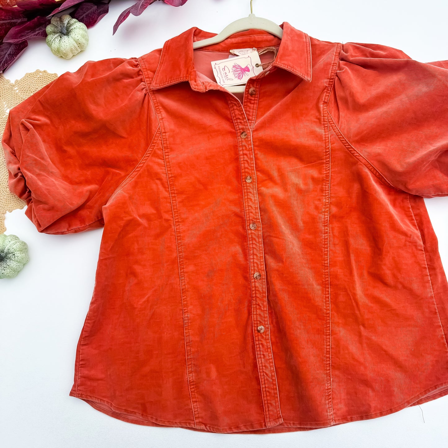 Rust corduroy button-up with puff sleeves, front view