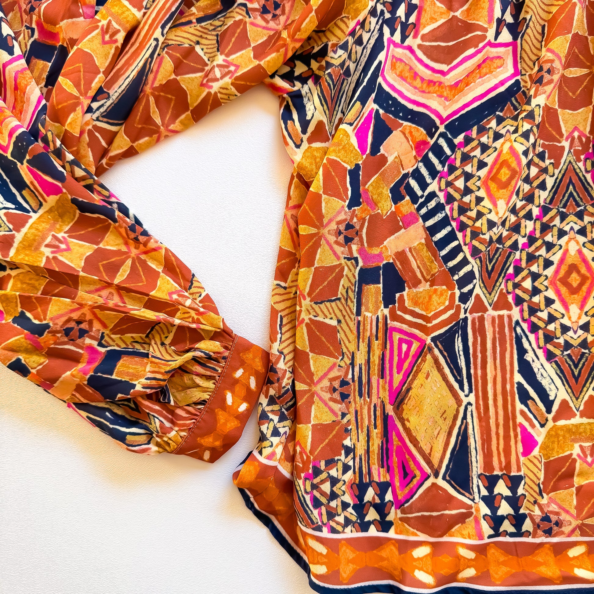 Desert Mosaic Bib Yoke Blouse sleeve cuff and hem
