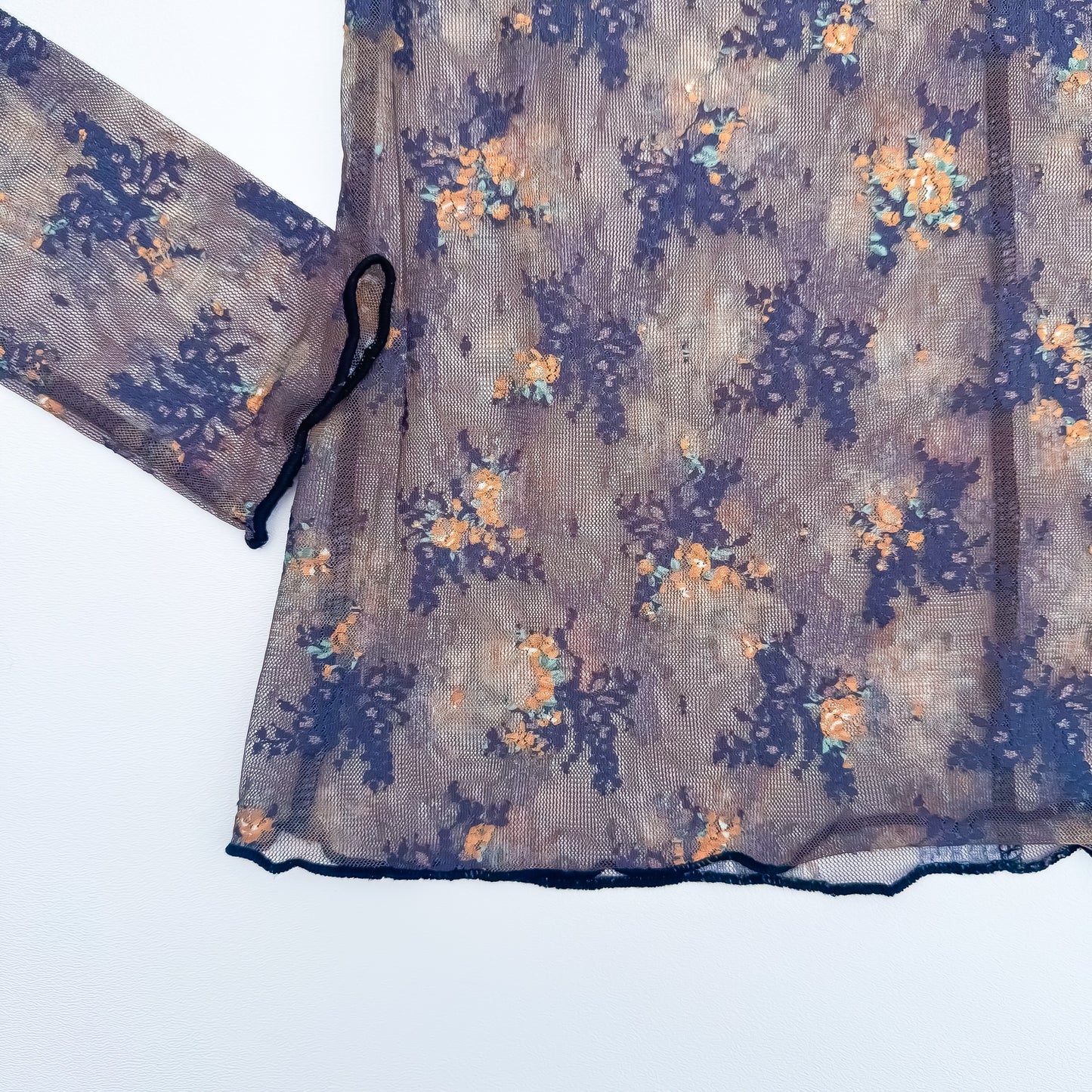 Floral mesh top lettuce edge hem detail