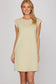 Ecru sleeveless side button knit mini dress on model