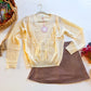 Cream fringe sweater flat lay