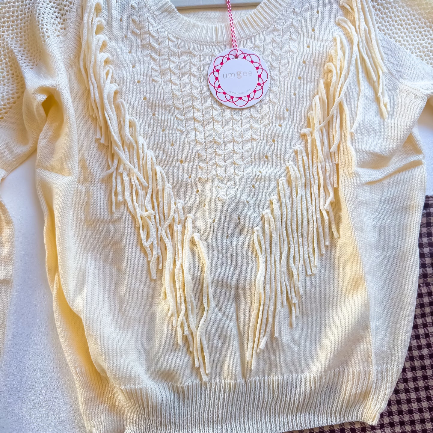 Cream fringe sweater front