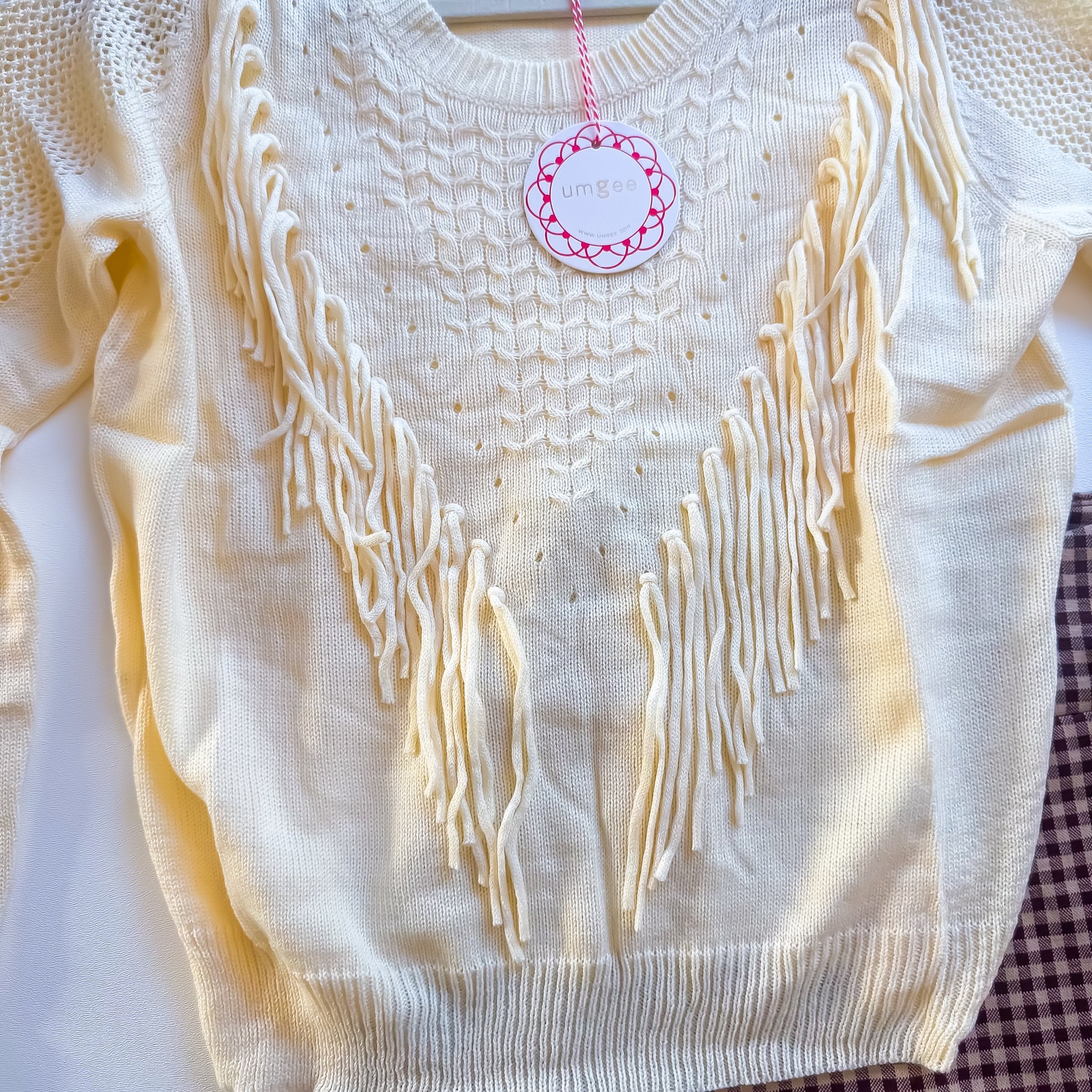 Cream fringe sweater front
