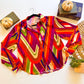 Groovy Getaway Retro Chevron Satin Button-Up Top flat lay