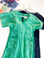 Green mineral wash jumpsuit bodice and pockets