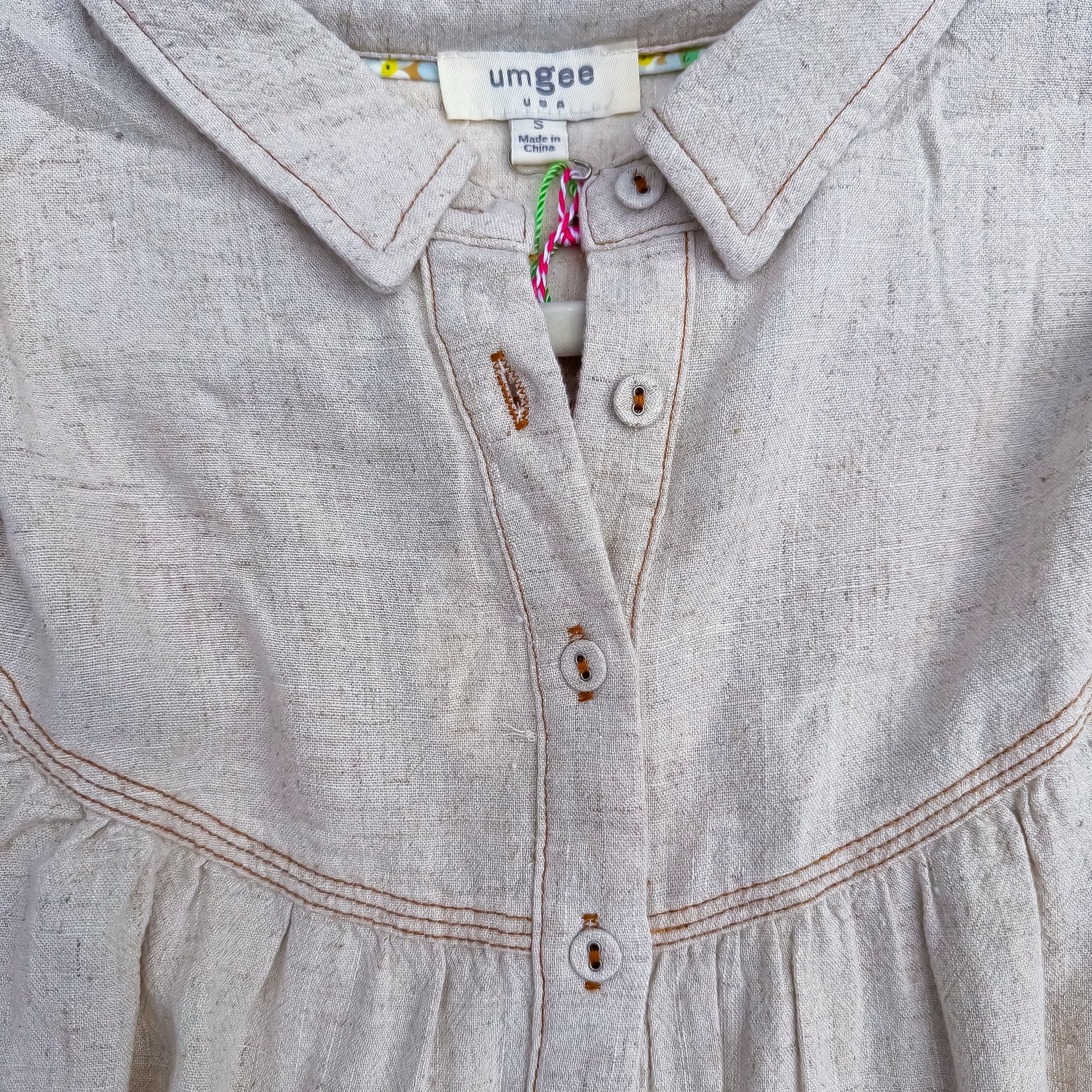 Oatmeal Fringe Hem Linen Button-Up Babydoll Top close-up