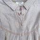 Oatmeal Fringe Hem Linen Button-Up Babydoll Top close-up