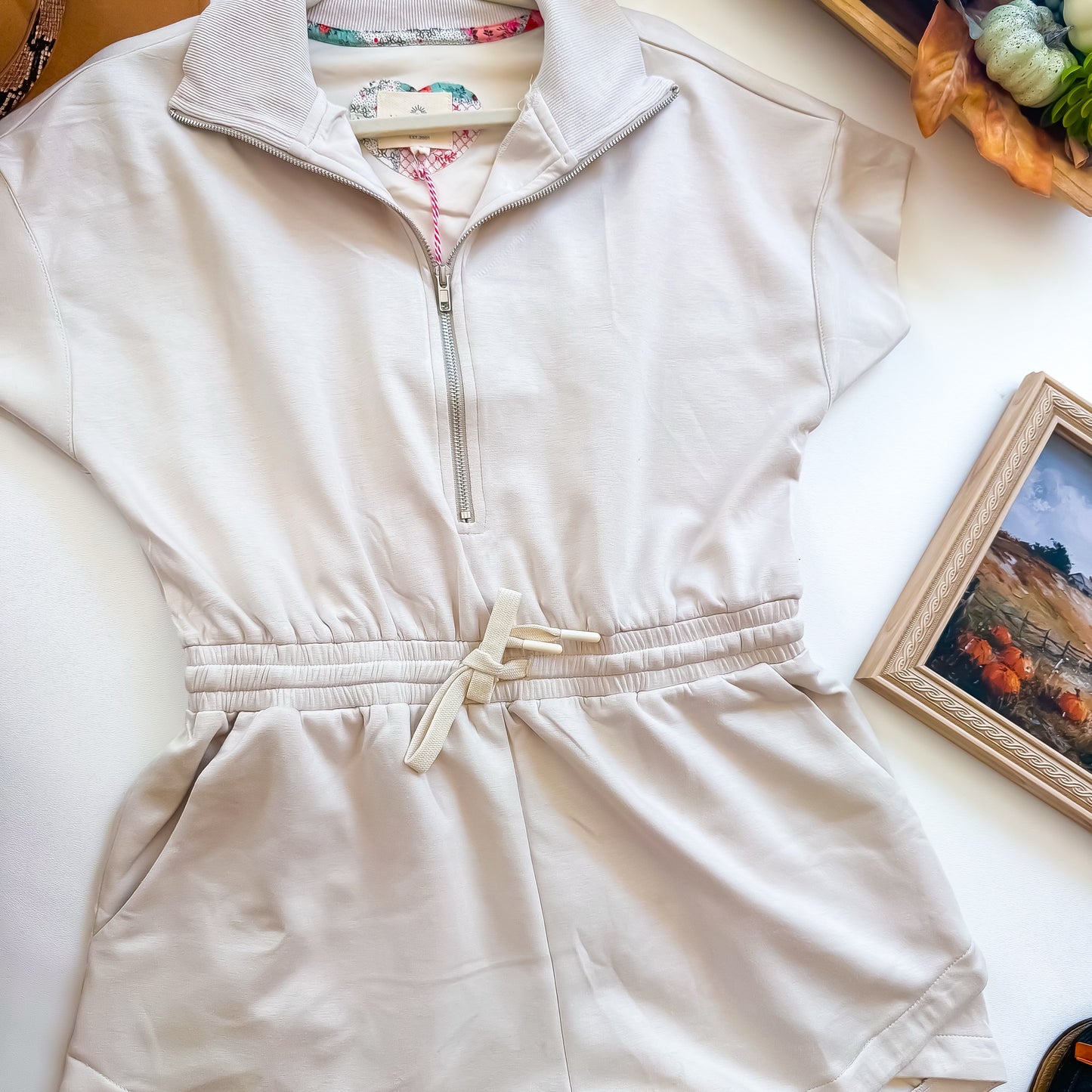 Cream romper upper body