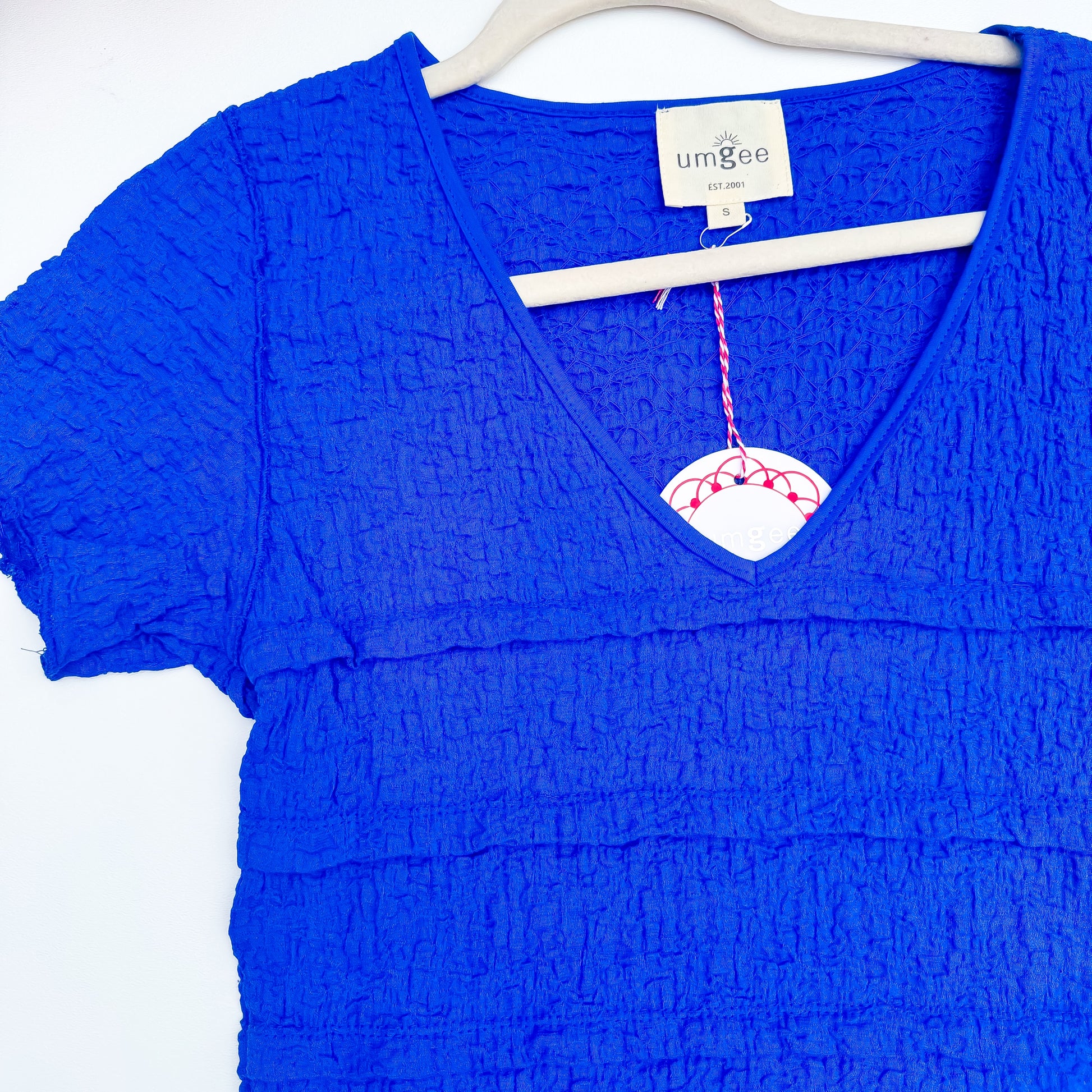 Royal Ripple Tiered Crinkle V-Neck Tee close-up