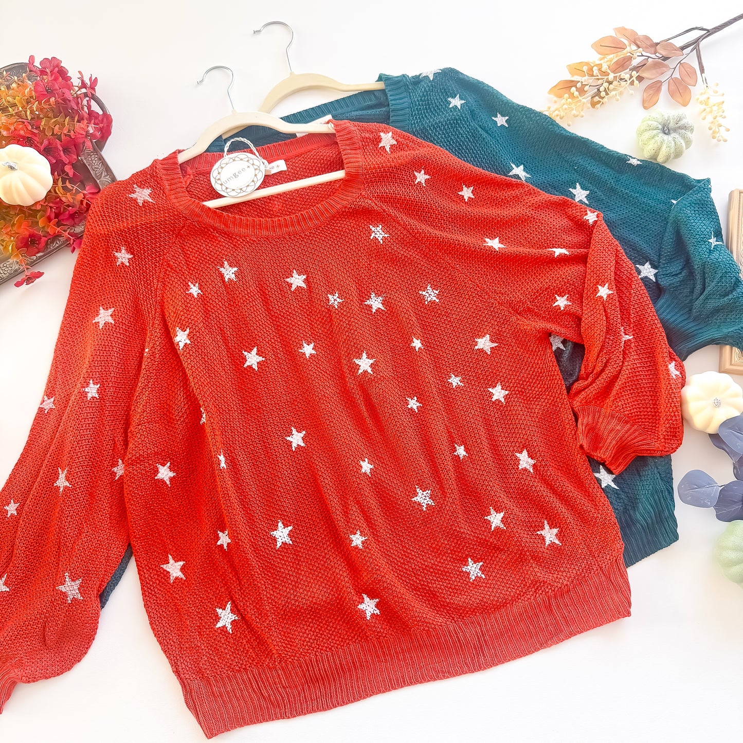Rust and teal star embroidered round neck sweaters