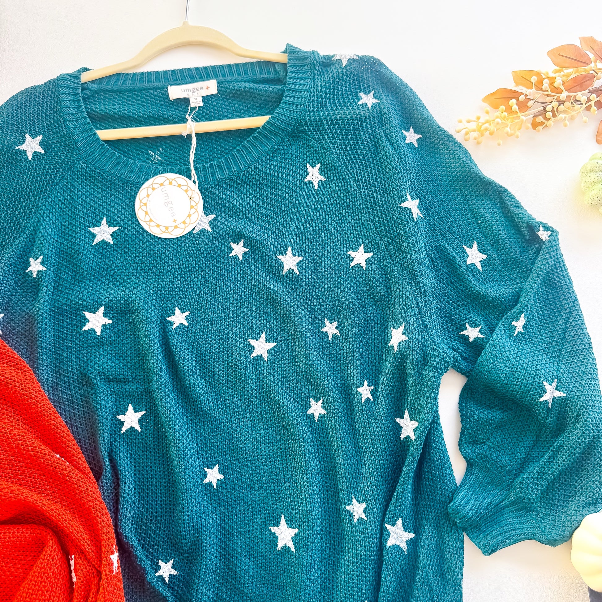 Teal star embroidered round neck sweater