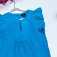 Turquoise ruffle sleeve keyhole top detail