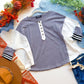 Varsity Weekend henley flat lay angled